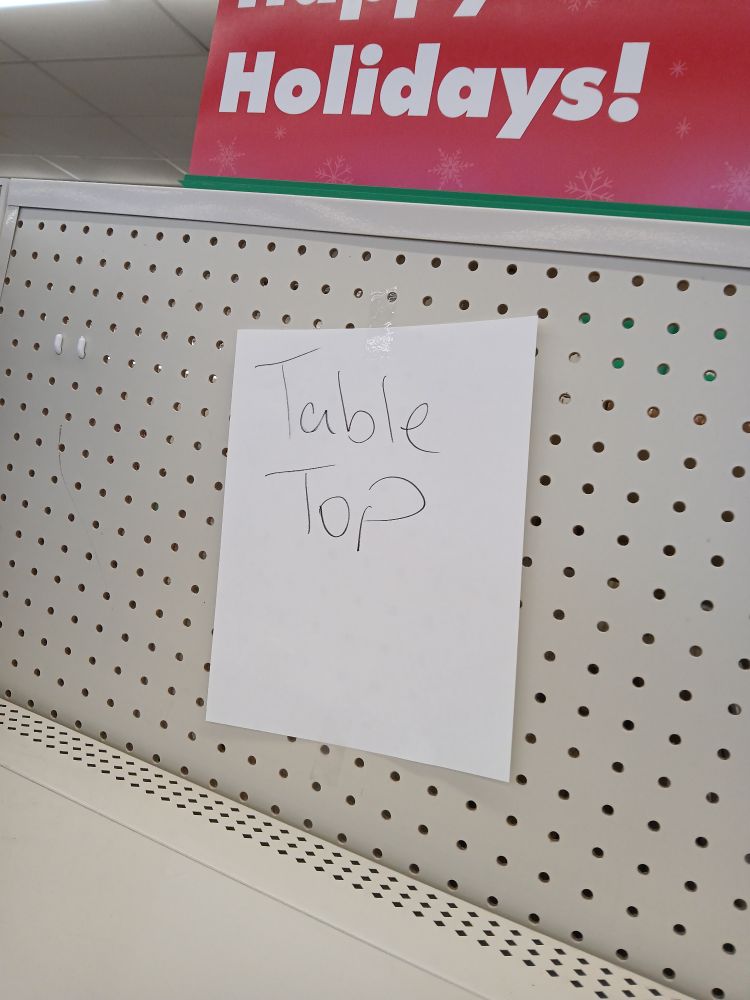 Hand written sign that says Table Top