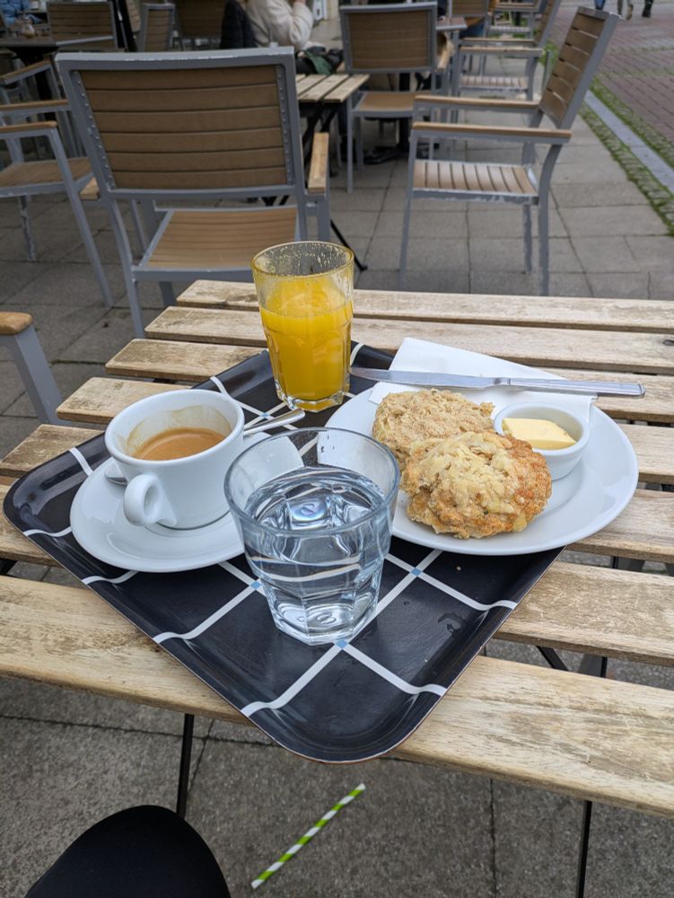 Coffee, fresh juice and a cheese scone