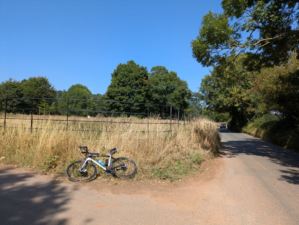 Bike reclining by Killerton House.