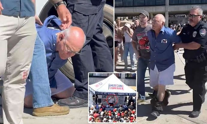 Images of Michael Mallinson, man falsely accused of shooting Kirk, being lead away by cops