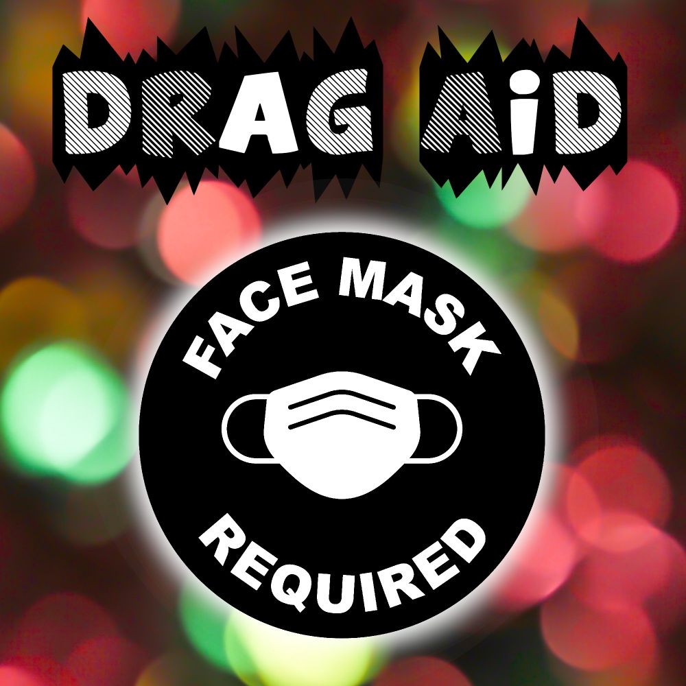 Text reads: "Drag Aid. Face mask required. There is a black & white logo of a face mask. Background is green & red fairy lights out of focus.