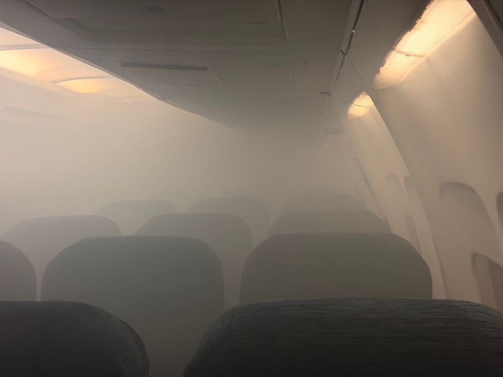 A smoke filled aircraft cabin 